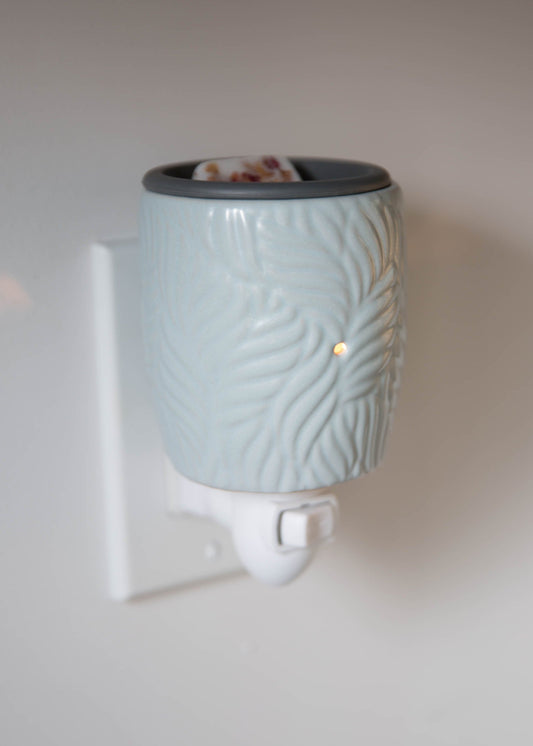 diffuseur mural utilisé avec cubes de cire parfumés citron et baies