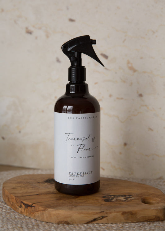 détail bouteille eau de linge parfumée tournesol et fleur
